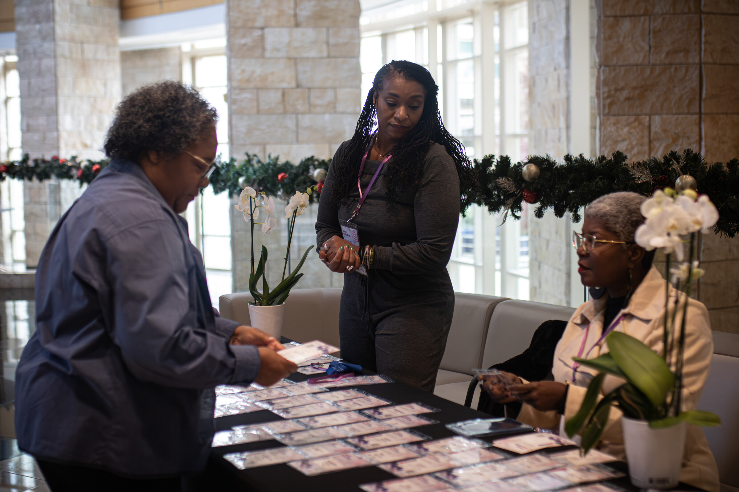 Council team members in conversation at a business development event