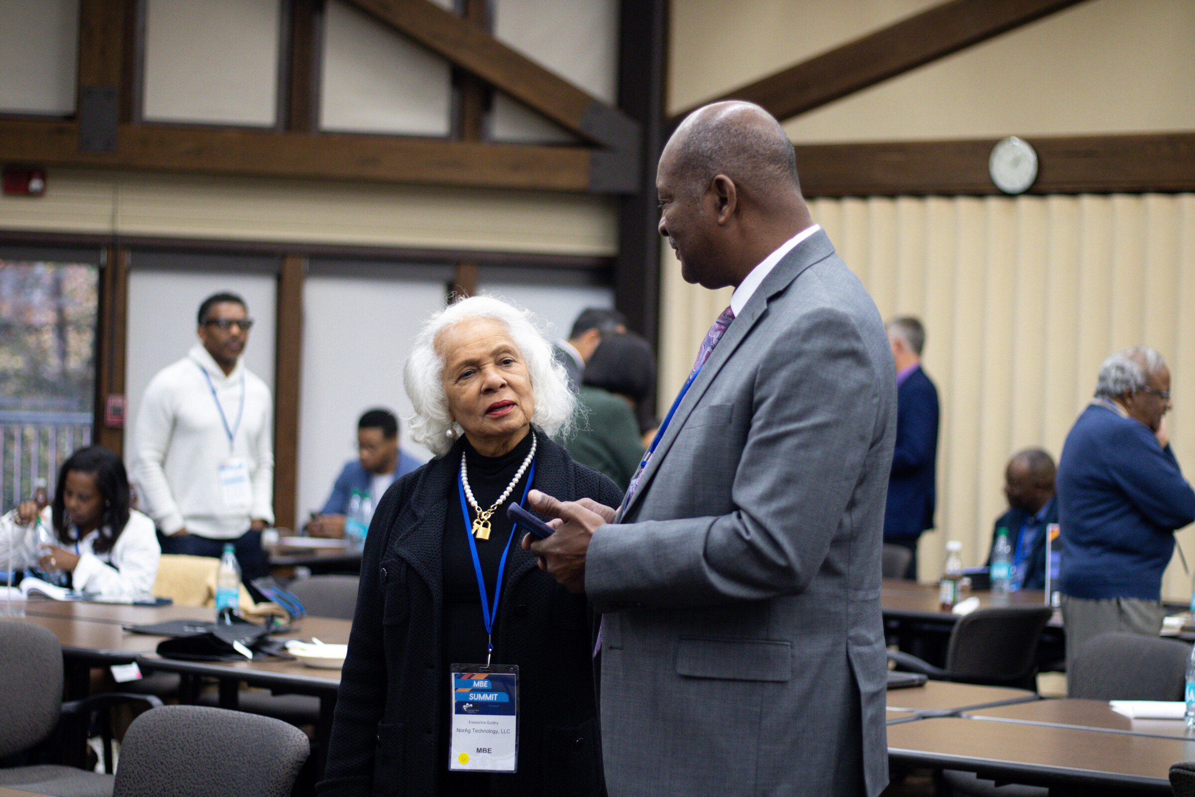 Council members building relationships during a networking conversation