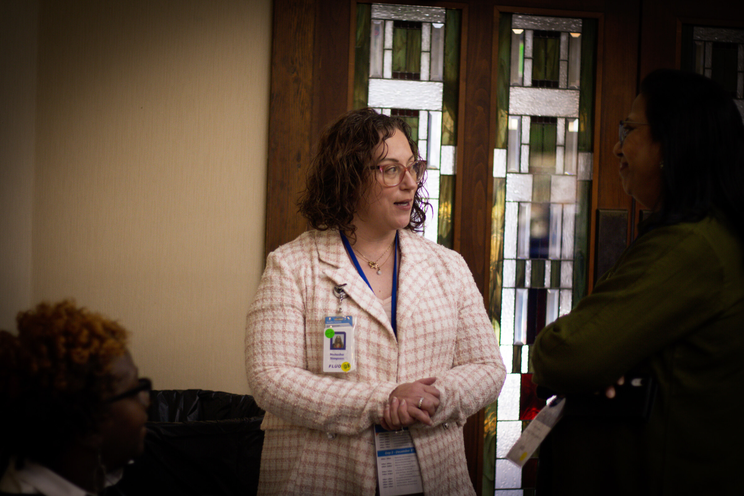 A Council team member in conversation with a program participant