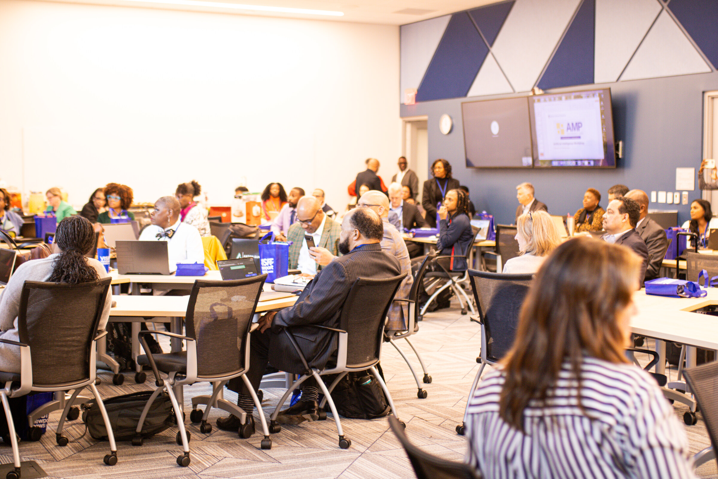 Business leaders in conversation during a Council development program