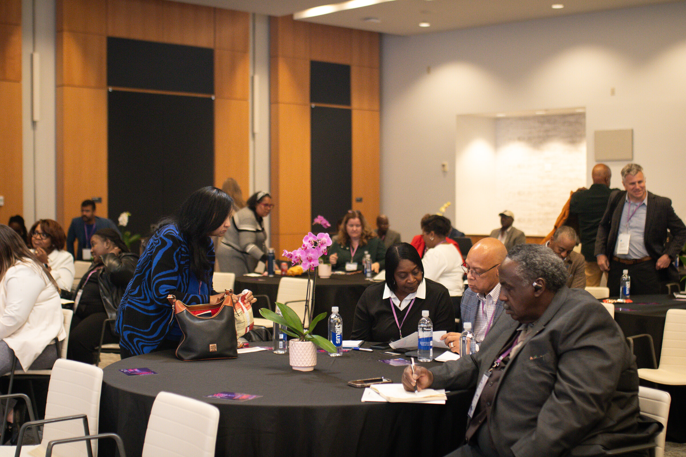Business owners collaborating around a table during a Council workshop
